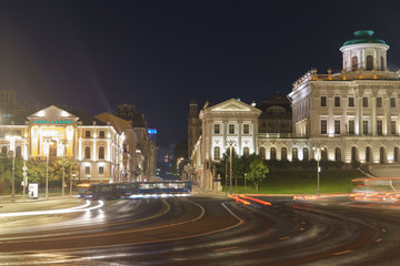 Long exposure image of Moscow downtown in summer night. Gallery A. Shilov, Pashkov House across the road with blurred motion. Translation of words "gallery A. Shilov"