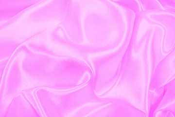 Beautiful pink satin luxury cloth texture can use as wedding background, fabric