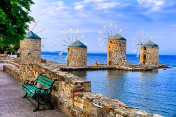 Selbstklebende Fototapeten Traditional Greece series - windmills over sea in Chios island © Freesurf