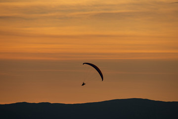 Sunset and paraglider