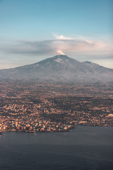 Volcano Etna seen from the plane at sunset