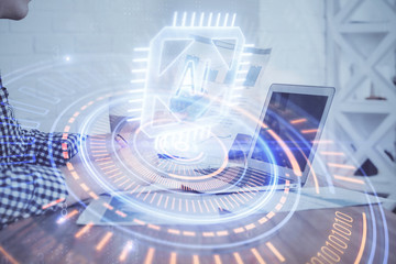 Double exposure of tech drawings with hands working on computer background. Concept of innovation.