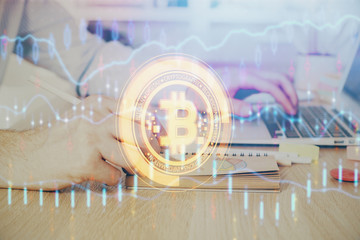 Blockchain theme hud with businessman working on computer on background. Concept of crypto chain....
