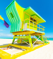 Colorful lifeguard tower under a blue sky in Miami Beach