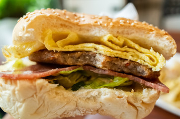 eat delicious hamburger at a restaurant