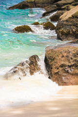 Large stones with turquoise water on the paradise island of Seychelles