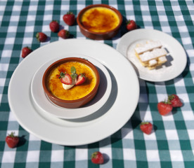Creme Brulee with strawberries and cream and shortbread