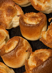 Traditional Yorkshire puddings typically served as a side with an English Sunday Roast dinner