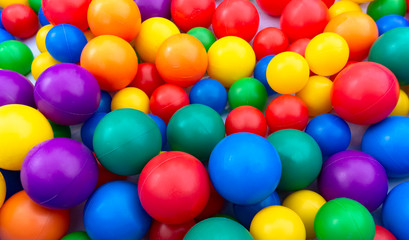 Fototapeta na wymiar Colored balls for a children's dry pool. Colored background