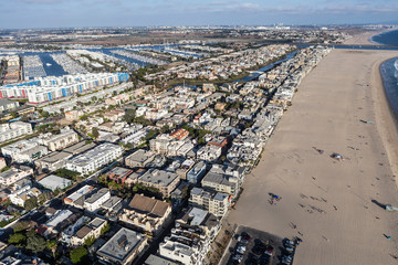 Afternoon aerial view of homes and streets along Venice Beach in Los Angeles California. - obrazy, fototapety, plakaty