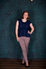 Fototapeta premium Portrait of Beautiful Young Woman in Studio