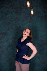 Fototapeta premium Portrait of Beautiful Young Woman in Studio