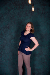 Naklejka premium Portrait of Beautiful Young Woman in Studio