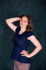 Fototapeta premium Portrait of Beautiful Young Woman in Studio