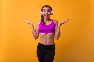 Smiling woman with beautiful body after diet, isolated on white with copyspace for text.Sport, healthy lifestyle, gym, good body condition, women health, fitness concepts. 