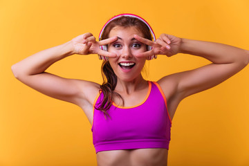 Smiling woman with beautiful body after diet, isolated on white with copyspace for text.Sport, healthy lifestyle, gym, good body condition, women health, fitness concepts. 