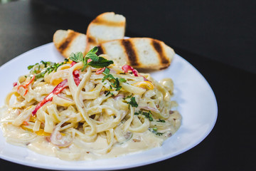 pasta with tomato sauce and basil