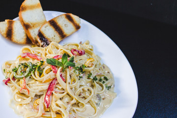 pasta with tomato sauce and basil