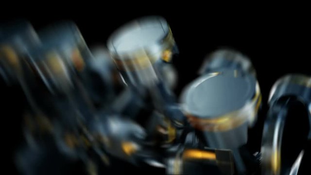 A close-up of engine in slow motion, pistons and valves.