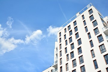 Fototapeta premium Multistory new modern apartment building. Stylish living block of flats.