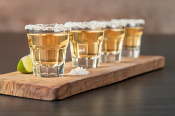 Tequila shots in a row. Four Tequila shots served in a row