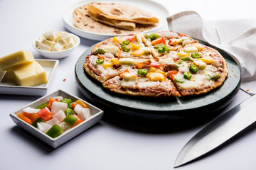 Chapati Pizza made using leftover Roti / Paratha with Cheese, vegetables, paneer and Sausage