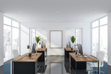 White open space office with poster