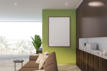 Green and brown panoramic living room with poster