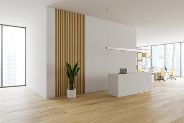 Office interior with white reception desk
