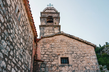 Fototapeta na wymiar Low angle view on the Roman Catholic Church Our Lady of Remedy in Kotor, Montenegro