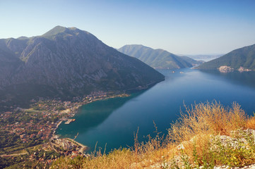 Fototapeta na wymiar Beautiful summer Mediterranean landscape. Montenegro, view of Kotor Bay and Risan town from a mountain slope