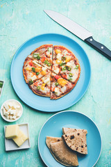 Chapati Pizza made using leftover Roti / Paratha with Cheese, vegetables, paneer and Sausage