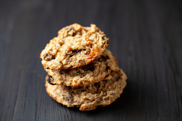 raisin cookies on black background