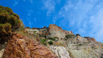 Mountains and blue sky with clouds.
