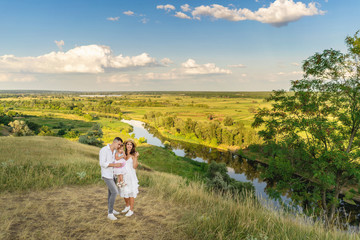 happy family having fun outdoors. incredible landscape