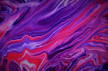 Red-blue-violet-white abstract background. Acrylic paints flow freely into one another, creating an...