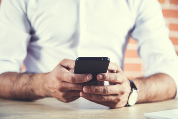 man hand phone