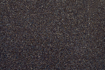 texture dark gray background with colored spots abstract pattern metal, plastic