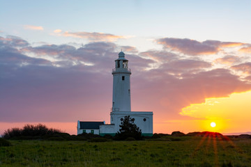 Fototapeta na wymiar Hurst Point Lighthouse during sunrise