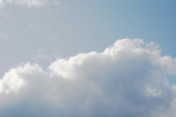 Fototapeta premium Blue sky with white clouds. Heavenly clear background.