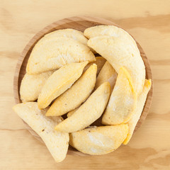 Colombian empanada, frozen raw product ready for frying.