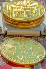 Bitcoins and New Virtual money concept.Gold bitcoins with Candle stick graph chart and digital background.Golden coin with icon letter B.Mining or blockchain technology