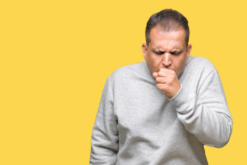 Middle age arab man wearing sport sweatshirt over isolated background feeling unwell and coughing as symptom for cold or bronchitis. Healthcare concept.