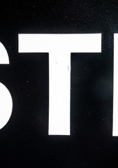 Written Wording in Distressed State Typography Found Letter T