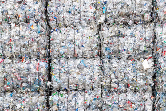 Plastics recycling centers and raw material