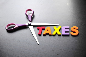 scissors and the alphabet TAXES