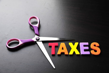scissors and the alphabet TAXES