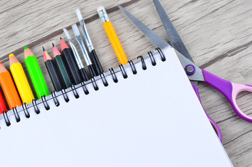 Photo of office and student gear over white background - Back to school concept