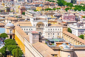 Fototapeta premium Buildings of Vatican Museums. Aerial view from dome of St. Peters Basilica, Rome, Italy