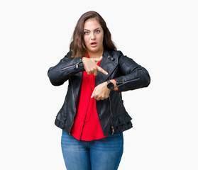 Beautiful plus size young woman wearing a fashion leather jacket over isolated background In hurry...